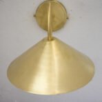 ✔ Solid Brass Construction: Combines durability and timeless beauty. ✔ Brushed Brass Finish: more subtle matte look, resistant to visible wear and scratches compared to high-shine finishes. ✔ E27 Base Compatibility: Compatible with any E27 base (bulb not included). ✔ Customizable: Size and shape can be customized upon request to fit your space and design vision. ✔ Space-saving: Provides an excellent alternative without the risk of tipping over or taking up valuable space. ✔ Easy Installation: Comes with concealed wall bracket, which requires minimal effort for installation.